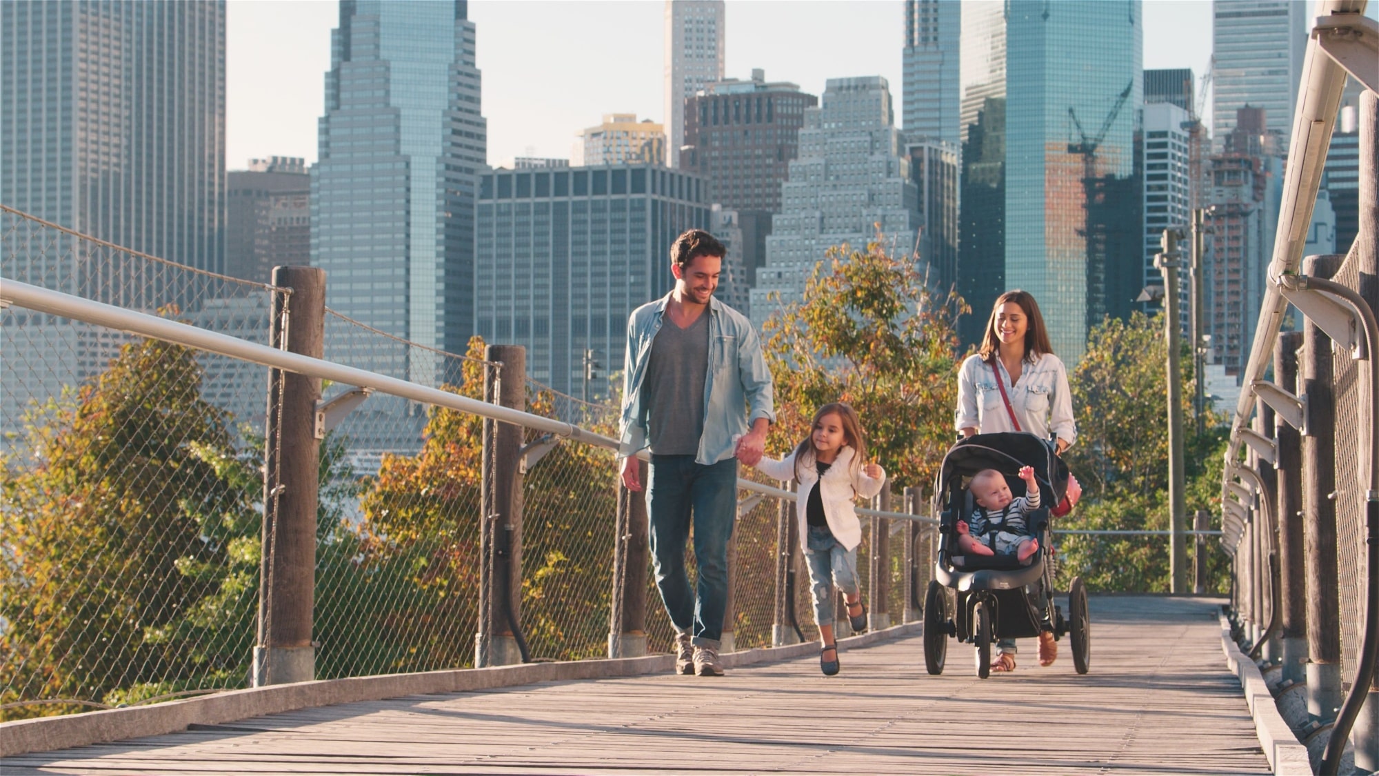 Family Day Out In New York City With Mum Pushing Baby In Buggy
