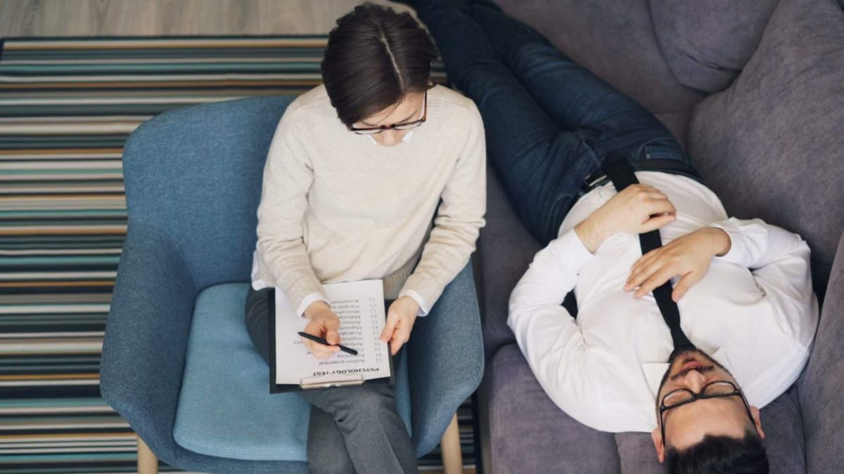 Professional man lying down while on Anxiety Treatment in Montclair